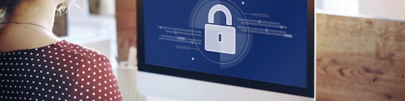 Woman working on computer network graphic overlay